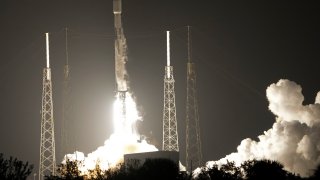 A SpaceX Falcon 9 rocket, with a payload including two lunar rovers from Japan and the United Arab Emirates