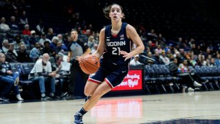 UConn guard Ines Bettencourt (21) drives during the second half of an NCAA college basketball game against Xavier, Thursday, Jan. 5, 2023, in Cincinnati.