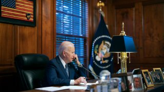 FILE - In this file image provided by The White House, President Joe Biden speaks with Russian President Vladimir Putin