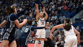 UConn's Azzi Fudd (35) shoots a 3-point basket in the first half of an NCAA college basketball game against Georgetown, Sunday, Jan. 15, 2023, in Hartford, Conn.