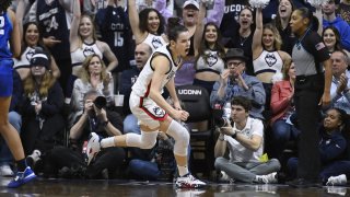 UConn's Lou Lopez-Senechal reacts after making a basket in the first half of an NCAA college basketball game against DePaul, Monday, Jan. 23, 2023, in Storrs, Conn.