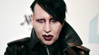 FILE – Marilyn Manson attends the 9th annual “Home for the Holidays” benefit concert in Los Angeles, on Dec. 10, 2019. Actor Esmé Bianco has settled a federal lawsuit with Marilyn Manson in which she alleged sexual, physical and emotional abuse, attorneys for both sides said Wednesday. Bianco has agreed to resolve her claims against Manson and his record company “in order to move on with her life and career,” lawyer Jay Ellwanger said in an email.