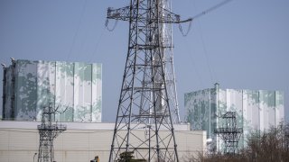 FILE - This picture taken on March 5, 2022 shows unit 6 (left) and unit 5 (right) reactor buildings at the Tokyo Electric Power Company