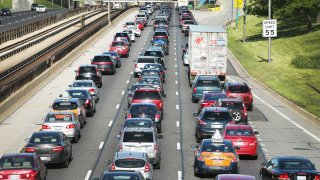 FILE - Traffic jams up on the Kennedy Expressway on May 23, 2014 in Chicago, Illinois.