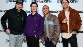 Kendal Schmidt, Logan Henderson, Carlos PenaVega and James Maslow of Big Time Rush visit SiriusXM at SiriusXM Studios on Feb. 6, 2023, in New York City.