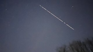 A string of Starlink satellites passes over Norwich Monday evening.