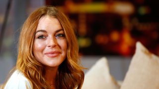 Lindsay Lohan attends/performs during a photocall for “Speed The Plow” at Playhouse Theatre on September 30, 2014 in London, England.