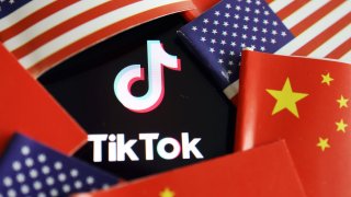 China and U.S. flags are seen near a TikTok logo in this illustration picture taken July 16, 2020.