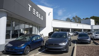 A vehicle charges a Tesla Supercharging station in Corte Madera, California, US, on Thursday, March 2, 2023.