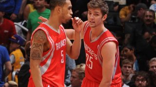 Courtney Lee #5 and Chandler Parsons #25 of the Houston Rockets come together during their game at Staples Center on April 6, 2012 in Los Angeles, California.