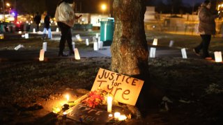 FILE - People attend a candlelight vigil in memory of Tyre Nichols at the Tobey Skate Park on January 26, 2023 in Memphis, Tennessee.