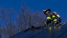 Hamden Firefighters respond to a fire on Harmon Street on Thursday.