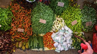 The International Monetary Fund has released new economic forecasts and warns that it will be hard for policymakers to bring down inflation while keeping a growth momentum.