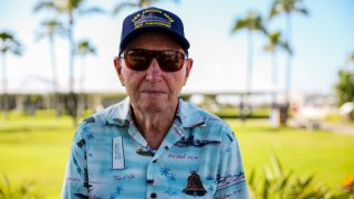 In this photo provided by the U.S. Marine Corps, former U.S. Navy coxswain Howard “Ken” Potts attends the Freedom Bell Opening Ceremony and Bell Ringing at USS Bowfin Submarine Museum & Park on Pearl Harbor, Hawaii, Dec. 6, 2016. Potts, one of the last two remaining survivors of the USS Arizona battleship, which sank during the 1941 Japanese attack on Pearl Harbor, died Friday, April 21, 2023, in Provo, Utah. Howard Kenton Potts was 102.