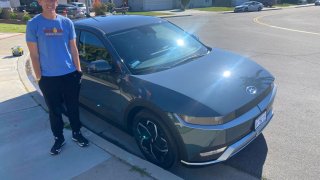 Dave Walters of Orange County, California, stands by his newly leased Hyundai Ioniq 5 electric vehicle.