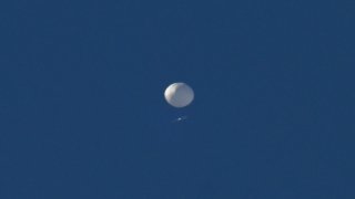 FILE - A Chinese balloon alleged to have surveillance capabilities flies above Charlotte, North Carolina, on Feb. 4, 2023.