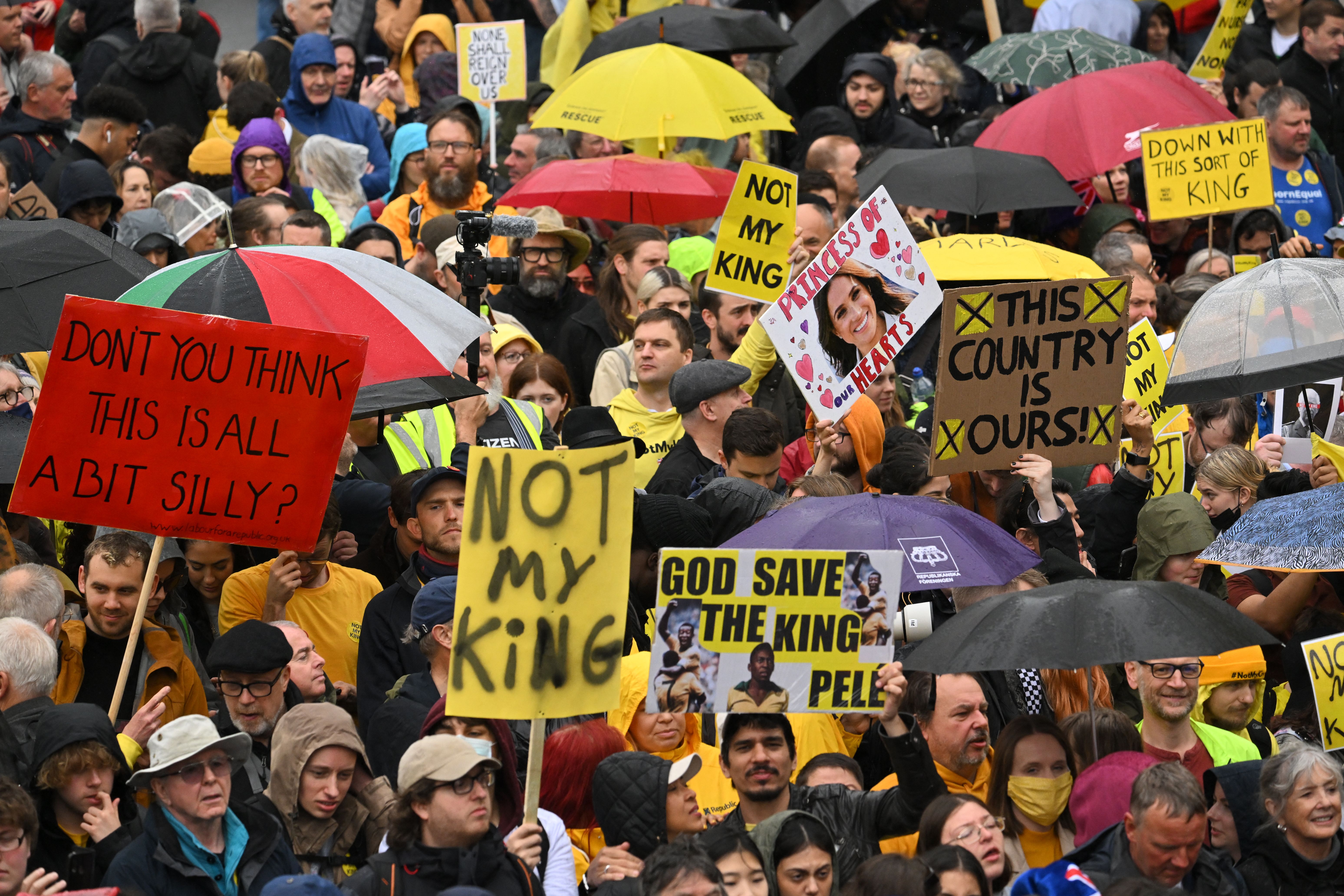 Members of the anti-monarchist group Republic stage a protest close to where Britain’s King Charles III and Britain’s Camilla, Queen Consort will be crowned at Westminster Abbey in central London on May 6, 2023.