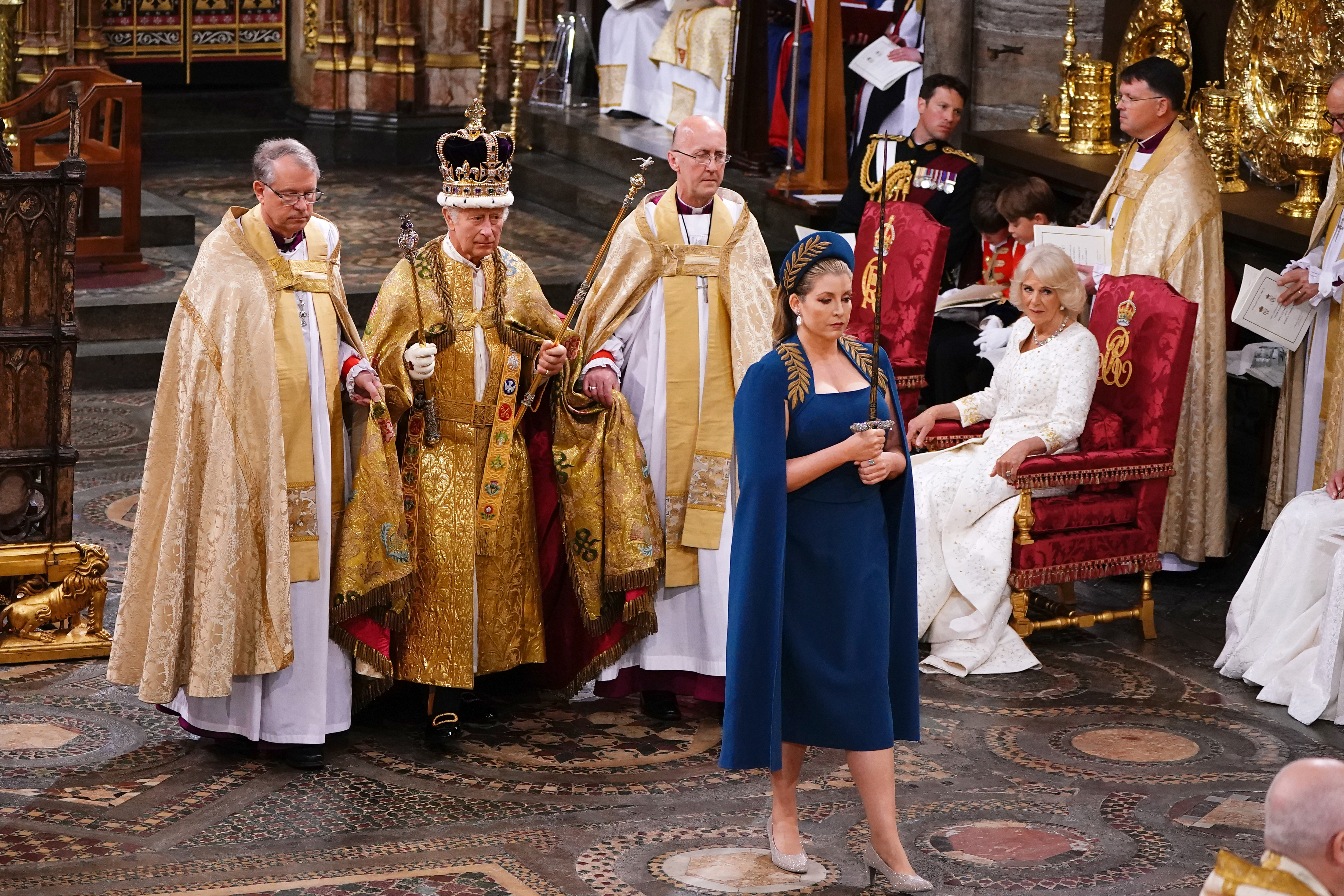 Penny Mordaunt leads King Charles III wearing the St Edward’s Crown during his coronation ceremony in Westminster Abbey on May 6, 2023 in London.