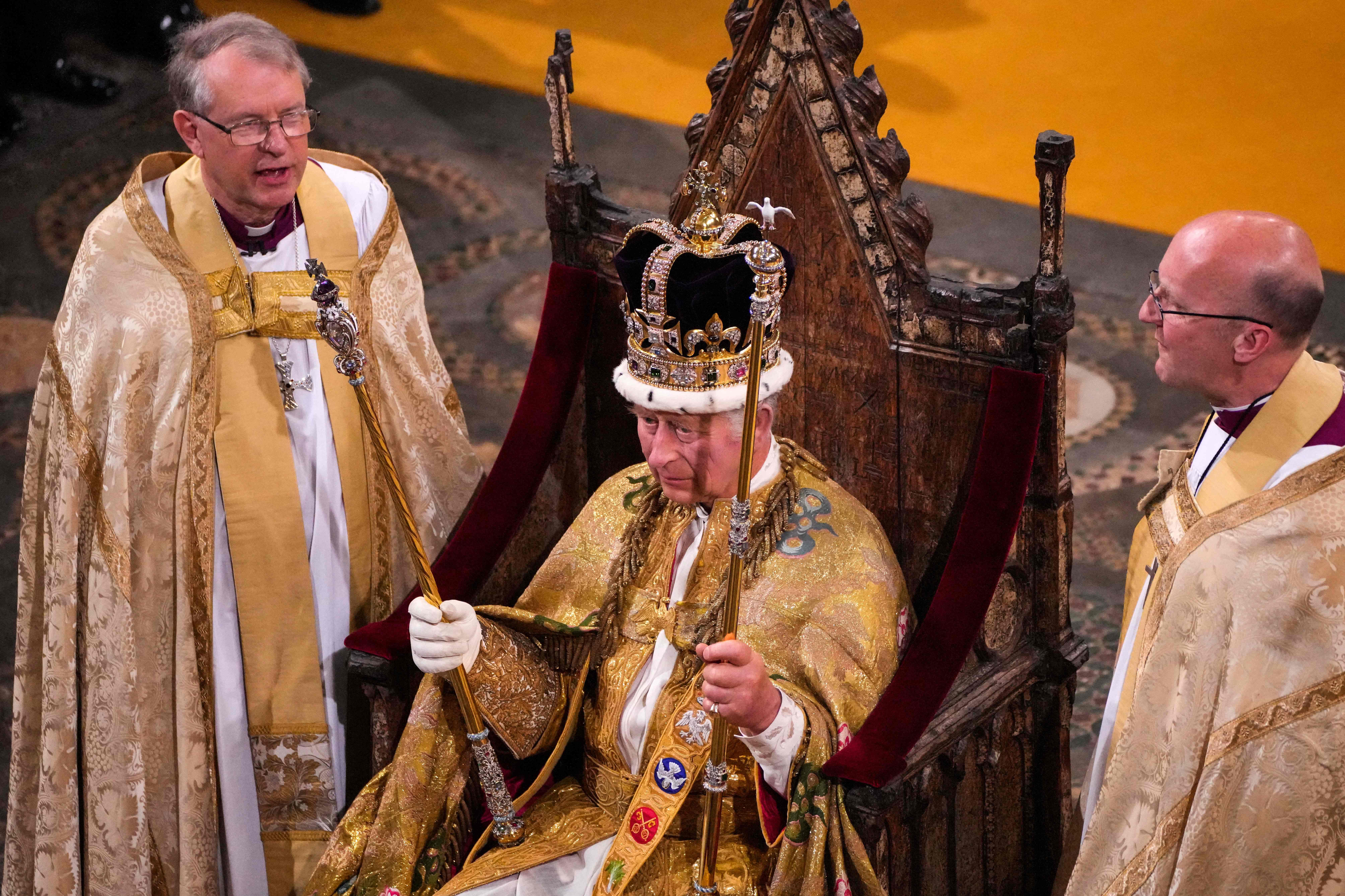 King Charles III with the St Edward’s Crown on his head at the Coronation Ceremony inside Westminster Abbey in central London on May 6, 2023.