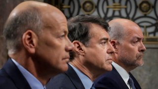 (L-R) Former CEO of Silicon Valley Bank Gregory Becker, former chairman of Signature Bank Scott Shay and former president of Signature Bank Eric Howell testify during a Senate Banking Committee hearing on Capitol Hill May 16, 2023 in Washington, DC. The hearing was held to examine the recent failures of Silicon Valley Bank and Signature Bank.