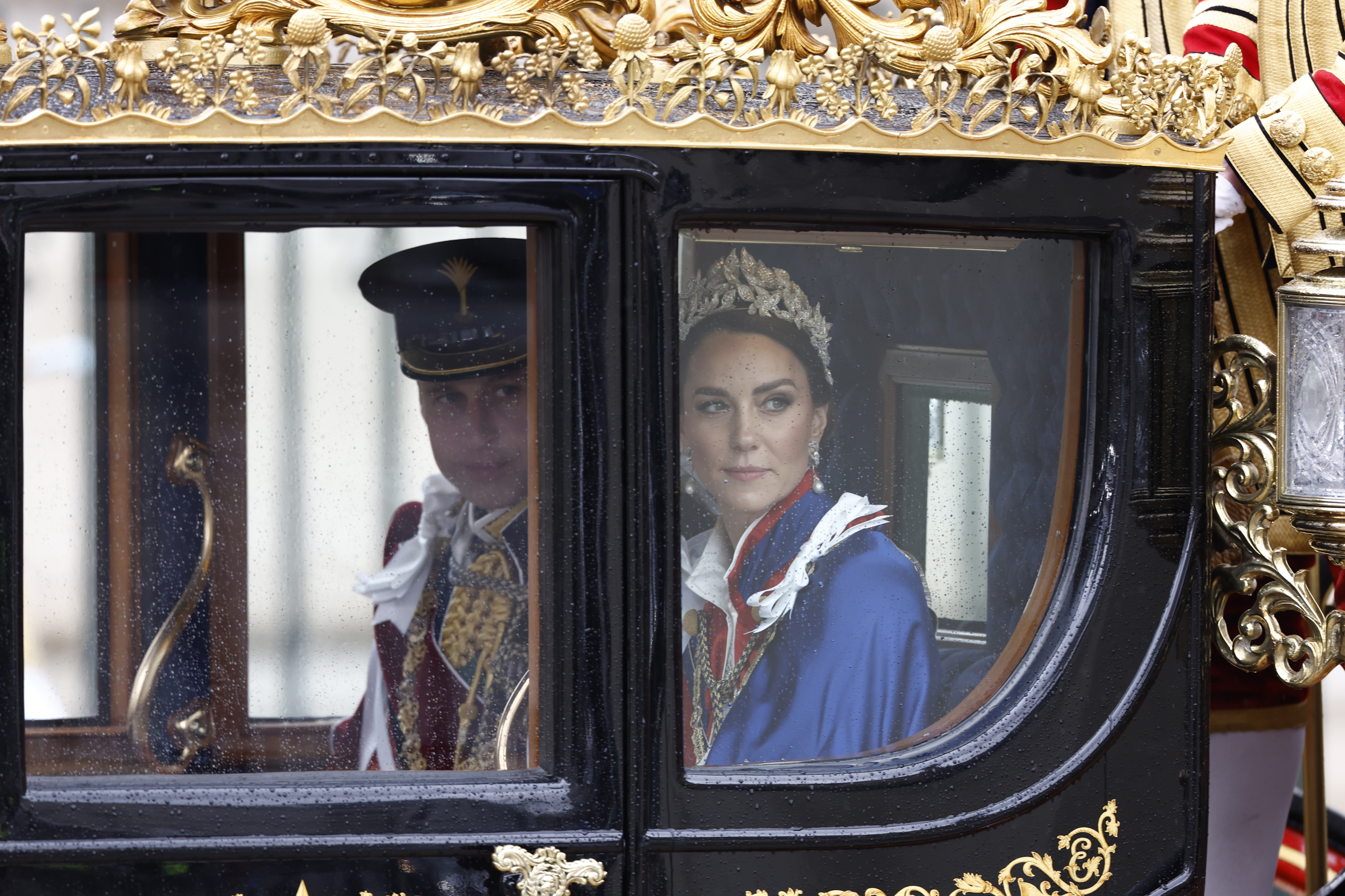 Prince William, Duke of Cambridge and Catherine, Princess of Wales depart from the Coronation of King Charles III and Queen Camilla on May 6, 2023 in London, England.