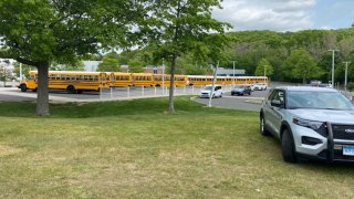 Buses outside Kaynor Technical High School in Waterbury