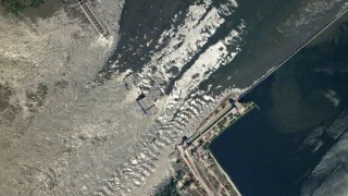 A satellite image captured by a SkySat shows the breached Kakhovka dam in Ukraine on June 6, 2023.