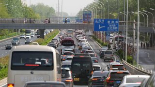Pictured here is a six-lane road in a congested area of Beijing near Sanyuanqiao on April 15, 2023.