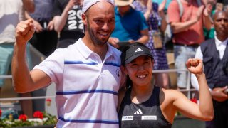 Japan’s Miyu Kato, right, and Germany’s Tim Puetz celebrate winning the mixed doubles final match of the French Open tennis tournament against Canada’s Bianca Andreescu and New Zealand’s Michael Venus in two sets, 4-6, 6-4, 1-0 (10-6), at the Roland Garros stadium in Paris, Thursday, June 8, 2023.