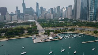 Haze from Canadian wildfires obscures buildings along the Lake Michigan shoreline in Chicago, June 29, 2023, in Chicago.