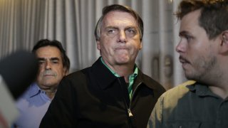 Brazil’s former President Jair Bolsonaro prepares to speak to the press at a restaurant in Belo Horizonte, Brazil, Friday, June 30, 2023. The panel of judges voted Friday to render Bolsonaro ineligible to run for office again after concluding that he abused his power and cast unfounded doubts on the country’s electronic voting system. (AP Photo/Thomas Santos)