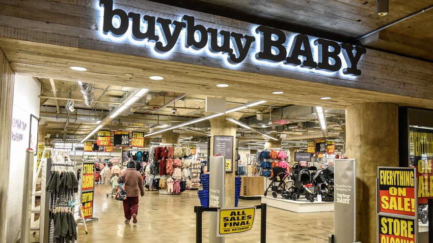 FILE - "Store Closing" signs at a Buy Buy Baby store in the Brooklyn borough of New York, Feb. 6, 2023.