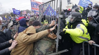 FILE - Protesters gather on the second day of pro-Trump events fueled by President Donald Trump's continued claims of election fraud in an to overturn the results before Congress finalizes them in a joint session of the 117th Congress on Jan. 6, 2021 in Washington, D.C.