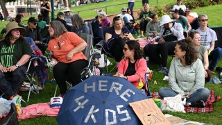 Here 4 the Kids staged a sit-in asking for an executive order to ban guns in Colorado on June 5, 2023 in Denver.