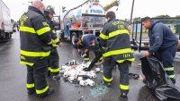 Porta-potty truck crash leaves Mass. road littered with toilet paper