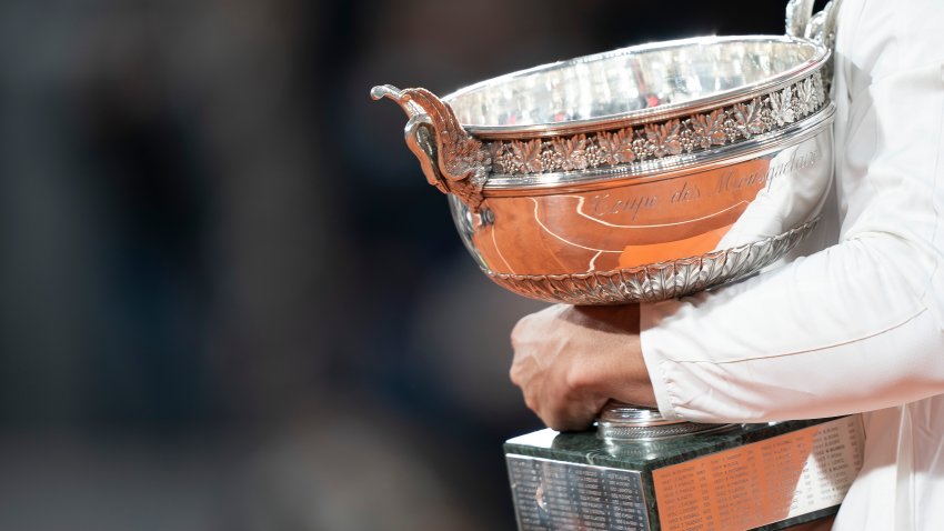 Oct 11, 2020;  Paris, France; Rafael Nadal (ESP) poses with the trophy after his match against Novak Djokovic (SRB) on day 15 at Stade Roland Garros.