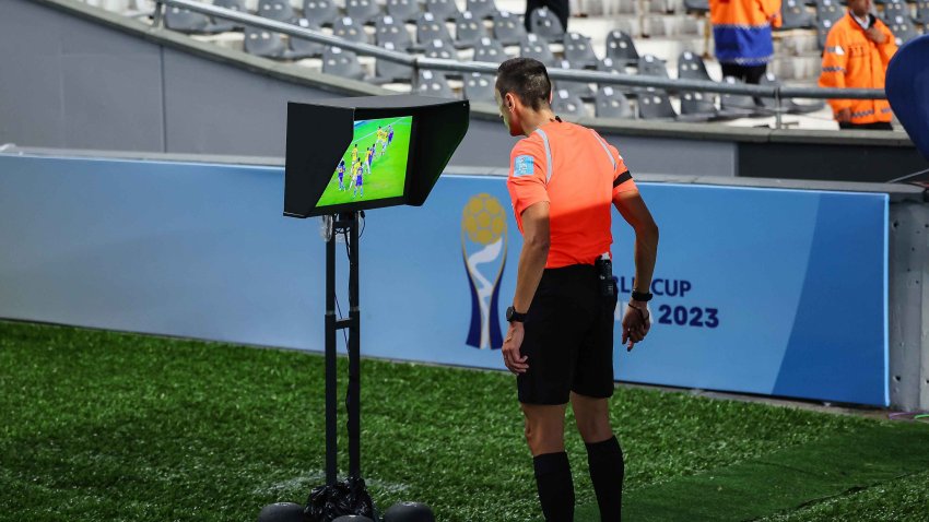 Referee Jose Maria Sanchez Martinez checks the VAR for possibly penalty during the FIFA U-20 World Cup Argentina 2023 Group C match between Japan and Colombia at Estadio La Plata on May 24, 2023 in La Plata, Argentina.