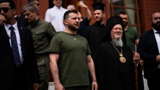 Ukrainian President Volodymyr Zelenskyy, center left, stands next to Ecumenical Patriarch Bartholomew I, the spiritual leader of the world’s Orthodox Christians, at the Patriarchal Church of St. George in Istanbul, Turkey, Saturday, July 8, 2023. Zelenskyy attended a memorial ceremony for the victims of the war in Ukraine led by Patriarch Bartholomew I.