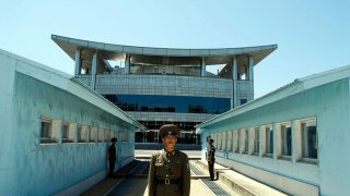 North Korean soldiers on duty on the Military Demarcation Line (Armistice Line) separating North and South Korea since 1953.