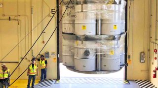 FILE - In this April 9, 2019, photo provided by Los Alamos National Laboratory, barrels of radioactive waste are loaded for transport to the Waste Isolation Pilot Plant, marking the first transuranic waste loading operations in five years at the Radioactive Assay Nondestructive Testing (RANT) facility in Los Alamos, N.M.