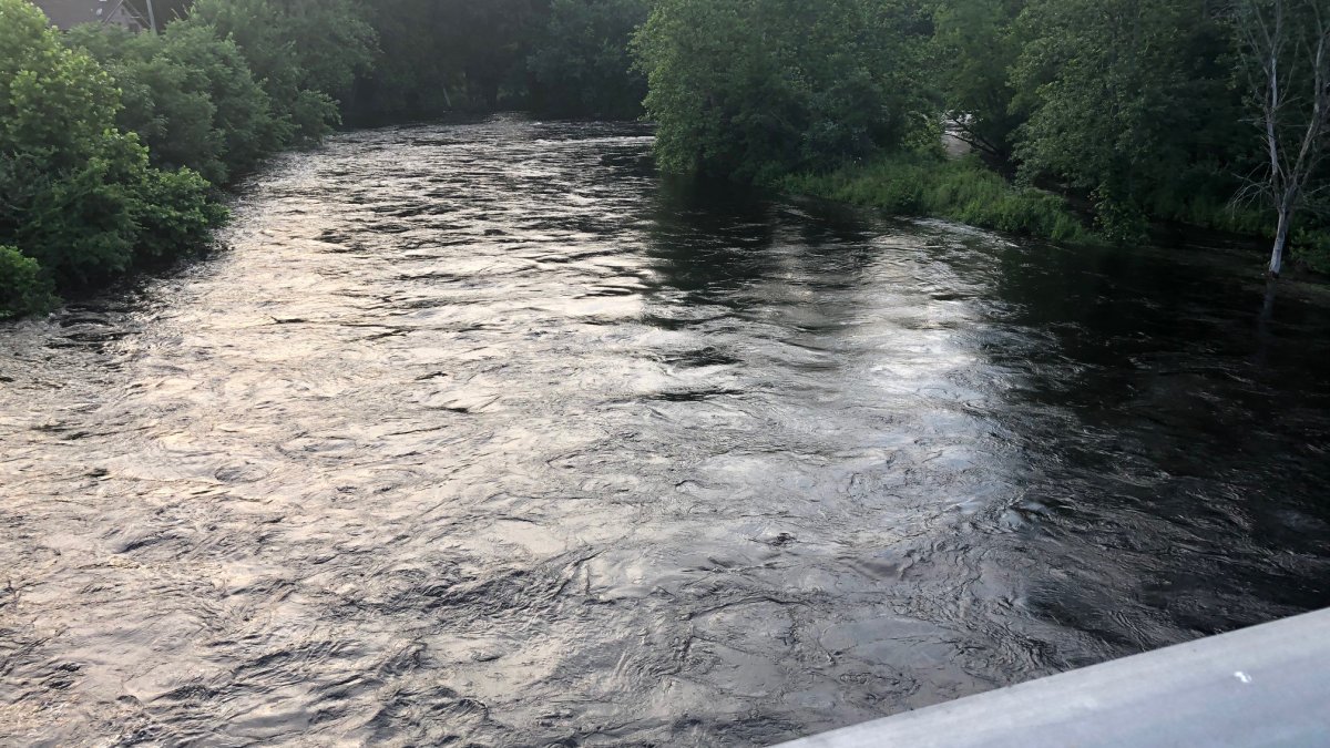 Mother dead, child hospitalized after being swept down river in Sprague