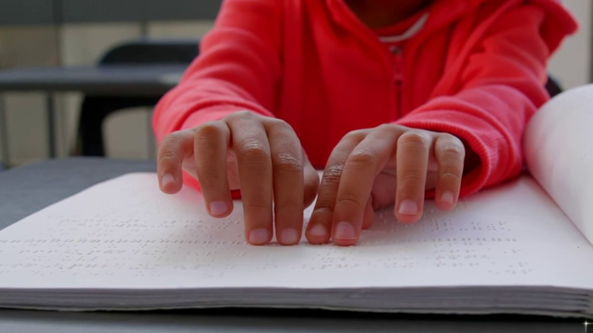 Incarcerated women get certified to create braille books for visually