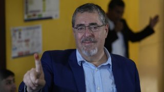 Bernardo Arevalo, presidential candidate with the Semilla Movement, shows his finger dyed with electoral ink after voting in the run-off presidential election in Guatemala