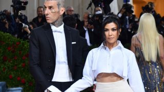 FILE - Kourtney Kardashian and Travis Barker arrive for the 2022 Met Gala at the Metropolitan Museum of Art on May 2, 2022, in New York.