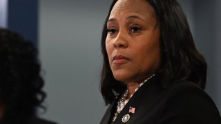 Fulton County District Attorney Fani Willis speaks during a news conference at the Fulton County Government building in Atlanta, Aug. 14, 2023.