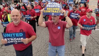 Demonstrators during a United Auto Workers (UAW) practice picket outside the Stellantis Mack Assembly Plant in Detroit, Michigan, US, on Wednesday, Aug. 23, 2023.