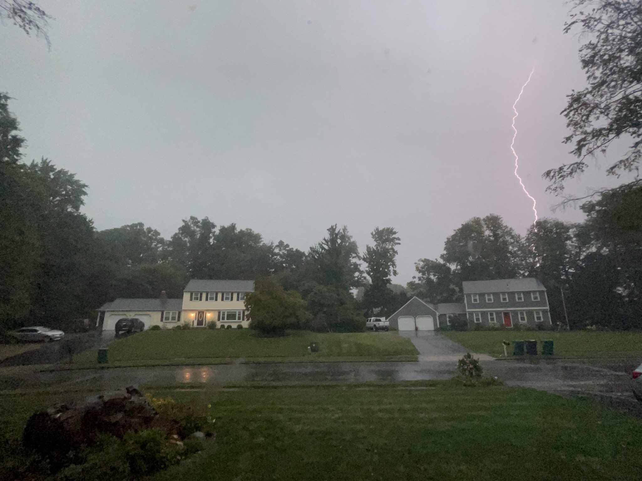 A bolt of lightning captured across the street from a home in Cheshire.