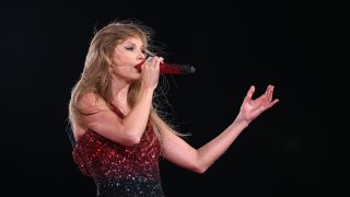 Singer Taylor Swift singing on stage.