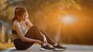 Sporty woman getting ready to work out.