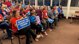 Members of the community attend a Board of Education meeting in Norwich on Sept. 18, 2023.